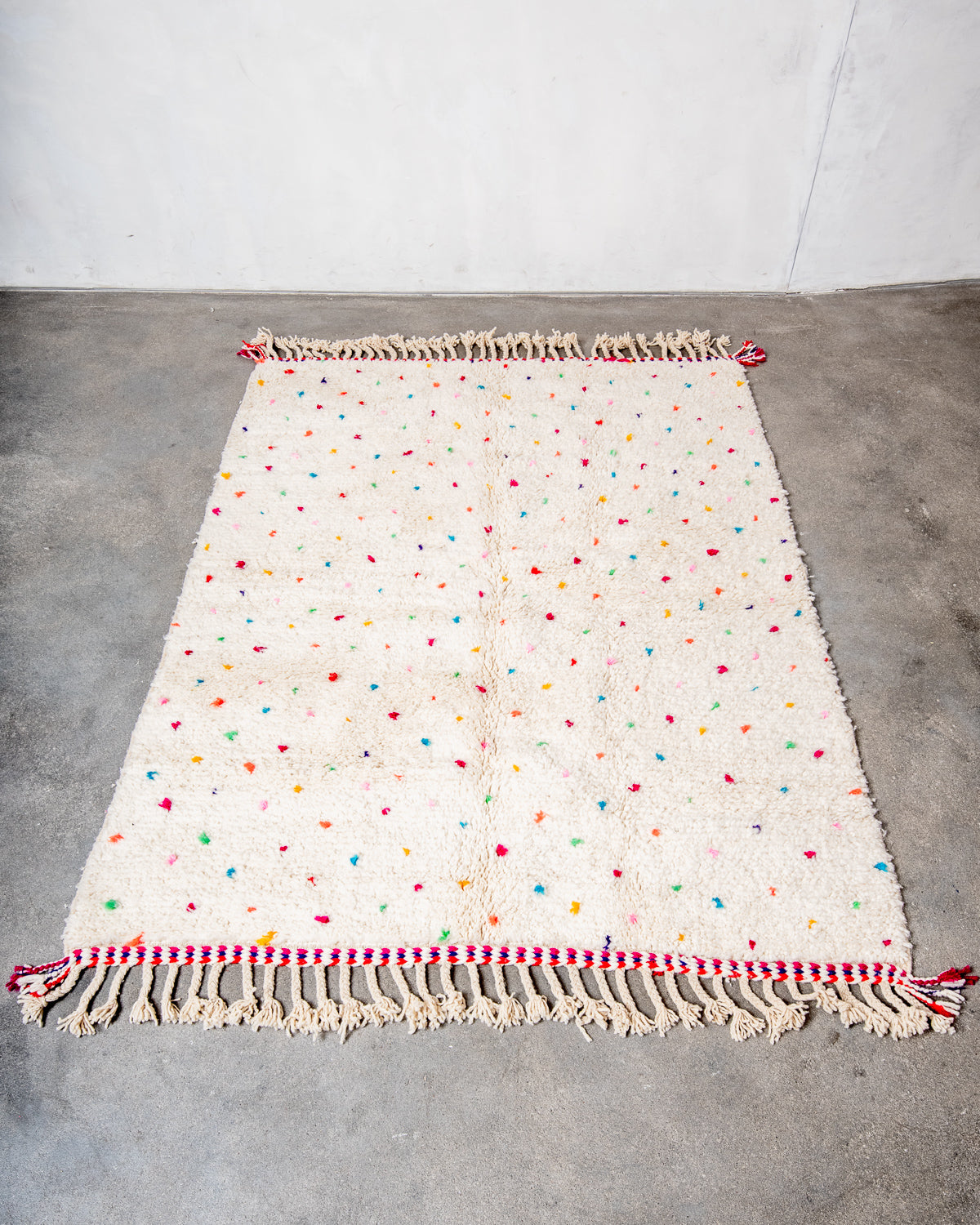 Modern, designer, handcrafted Berber rug from Morocco. Beniourain carpet with beautiful colours and patterns and fluffy wool texture.